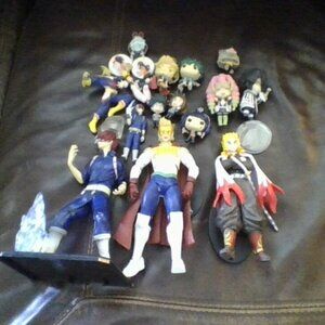 MHA + DEMON SLAYER assortment of figures, keychains, and pins
